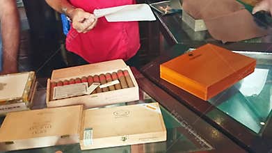 03.03.2024 - Camaguey, Santa Lucia, Cuba - Visitors and merchants in the cigar shop. Travel