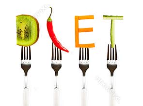 Word diet made of fresh tasty vegetables on forks