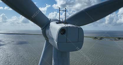 Wind turbine at Breezanddijk, De Afsluitdijk, The Netherlands, close up aerial view.
