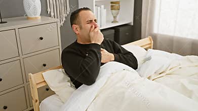 A hispanic man coughing in bed portrays illness in a home bedroom setting, suggesting health-related themes