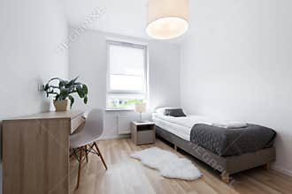 Small, modern sleeping room interior design