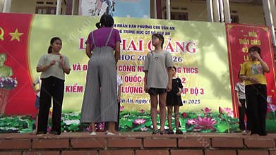 Vietnamese schoolgirls are practicing performing arts to prepare for the opening day of the new school year