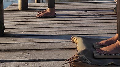 Woman Standing on a Sadhu Board