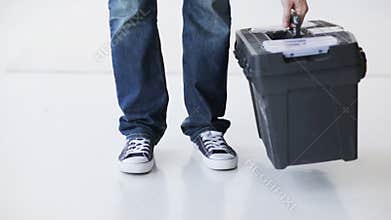 Handy man with big tool box ready for work