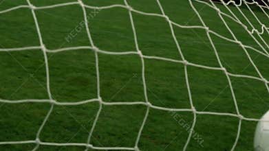 Football hitting the back of the net