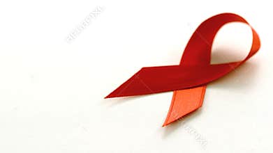 Red ribbon falling over