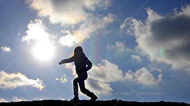 Girl silhouette training karate