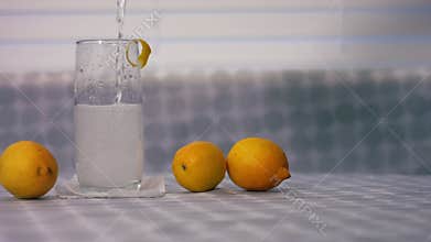 Serving of fizzy lemonade juice in a glass