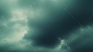 Dark storm clouds gathering in ominous sky