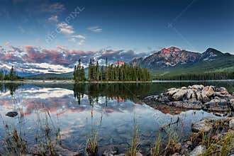 Sunrise at Pyramid Lake in Jasper National Park, Alberta, Canada, with lake mirror reflection of Pyramid Mountain