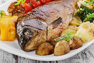 Baked fish with vegetables