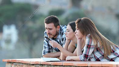 Three bored tourists on vacation