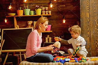 Playschool concept. Playschool kid play with mother. Playschool activities. Playschool education and child care