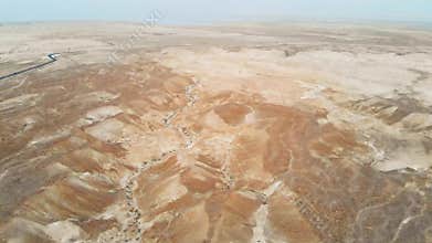 Aerial view of the Judean desert. Flying over desert lands near the dead sea. Jordan Israel Palestine