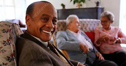 Group of Mixed race senior friends interacting with each other at nursing home 4k