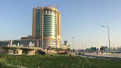 Bahrain, Manama 25,03,2018 . Center of Manama. Skyscrapers, cars on the avenue.