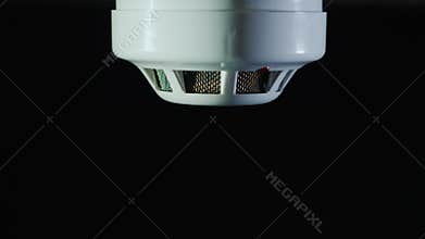 Man installs a sensor fire protection system