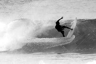 Surfer in black and white, North Shore, Hawaii