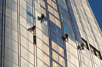 Window Cleaners Working on a new Skyscraper `The Vase` in Southwark London. June 2018