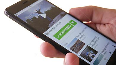 Pressing subscribe button on social media on social media app