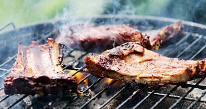 American bbq ribs cooking on grill