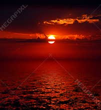 Bloody sunrise over sea