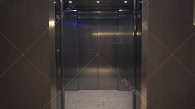 Elevator door opens and shuts
