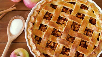 Close up of apple pie on wooden table