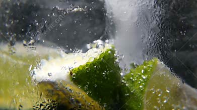 Detox or thirst concept. Healthy, dietary nutrition. Cold lemonade, lime drink. Black background