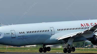 Air Canada jet taking off from Schiphol Airport, AMS