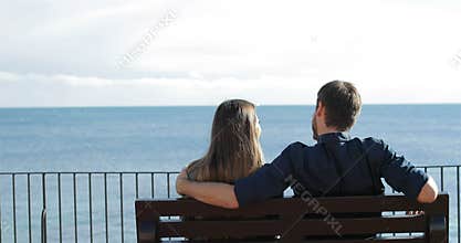 Man trying to hug her friend in the first date