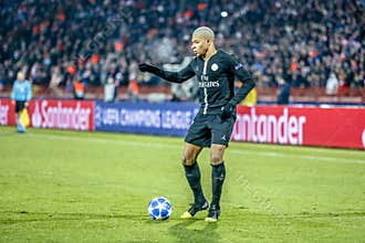Kylian Mbappe playing on a UEFA Champions League match