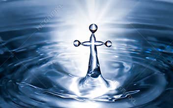 Christian holy water with crucifix cross background. Purity water for ritual