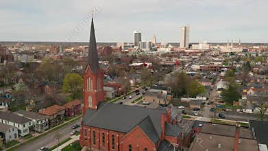 Aerial Elevating up over Long Flat Urban City SKyline in Fort Wayne Indiana