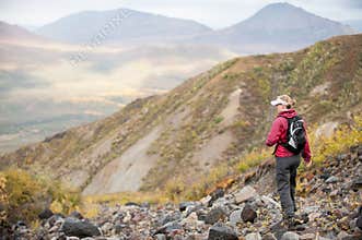 A woman hikes in the mountains of Alaska