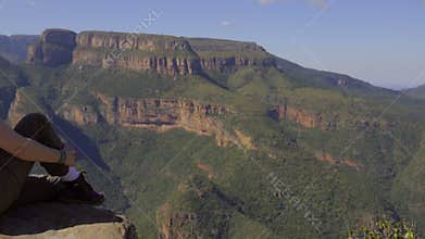 Pan away from a woman in Africa
