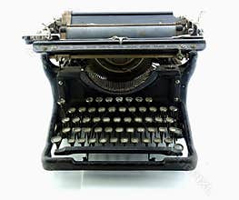 Old rusty typewriter isolated