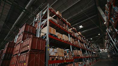 Finished products in boxes and containers on logistic warehouse shelves at plant