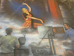 Hyderabad, India - January 1, 2009 Painting of a South Indian woman in saree dancing at Ramoji Film City