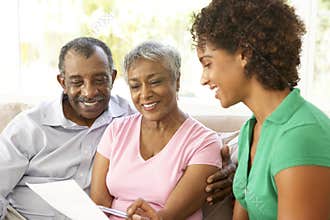 Senior Couple Talking To Financial Advisor