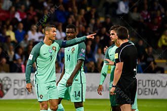 Football star Cristiano Ronaldo and referee