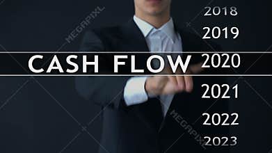 Cash flow for 2022, businessman selects financial report on virtual screen