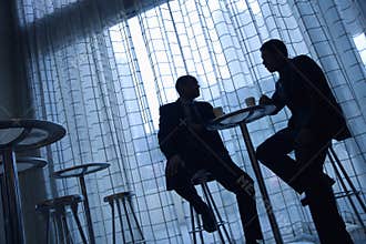 Businessmen Having Coffee