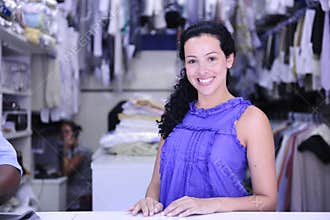 Happy owner of a dry cleaning service