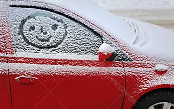Snow covered car