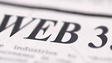 Footage of Web 3.0 written newspaper close up shot to the text