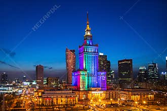 Night in Warsaw, Poland with rainbow architectural lighting