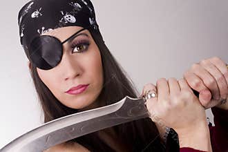 Female Pirate Showing Large Knife Blade Eyepatch