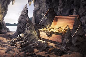 Open treasure chest with bright gold in a cave