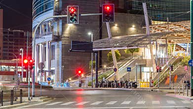 Traffic in Milan near modern skyscrapers in Porta Nuova business district night timelapse in Milan, Italy